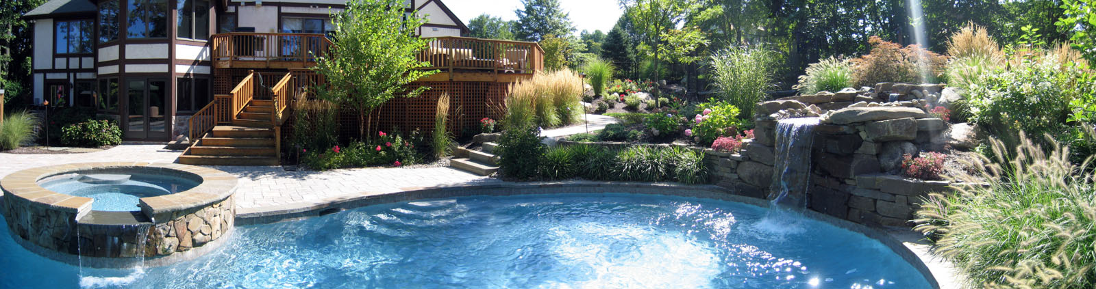 After Photo With Pool, Spa, and Deck
