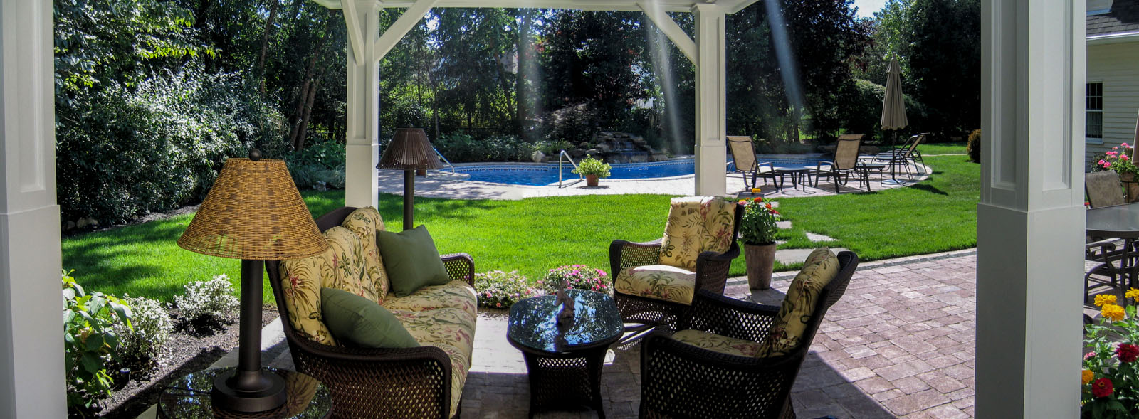 landscape design with patio, pavilion, and swimming pool
