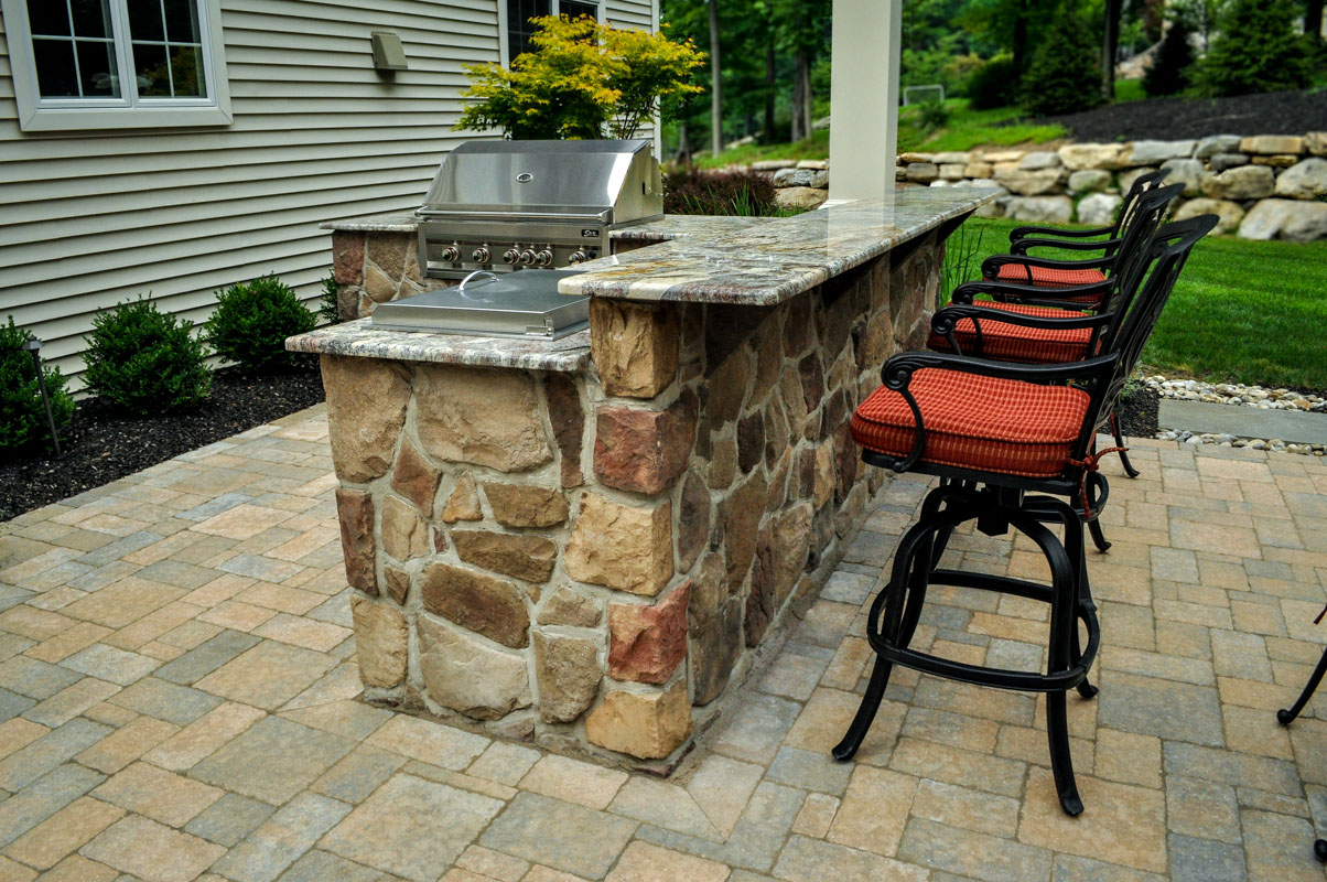outdoor kitchen with granite countertop