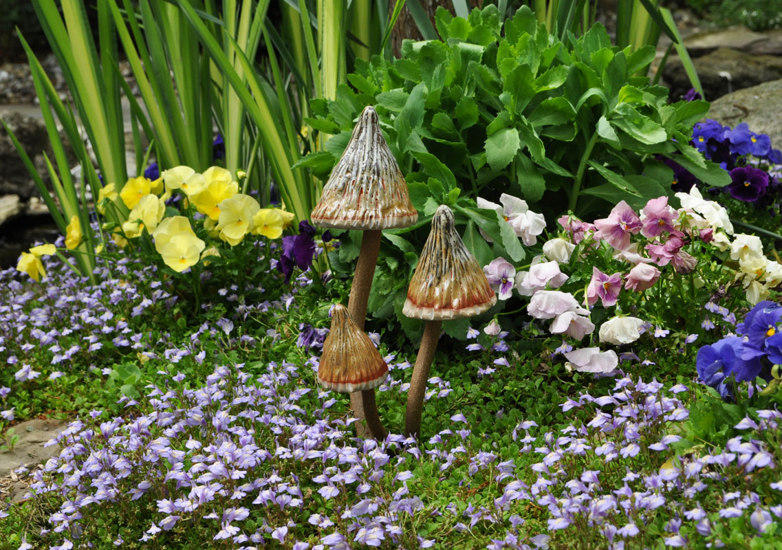 mushroom pottery, garden art, flower bed design
