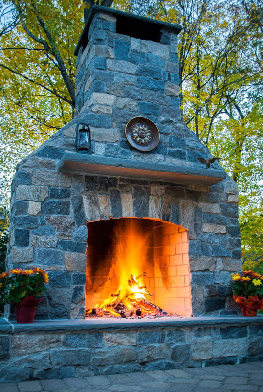outdoor fireplace, bluestone mantle and heart, granite veneer
