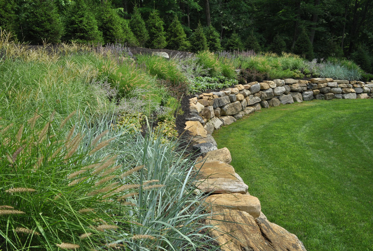 retaining wall with deer resistant plants and grasses - north jersey