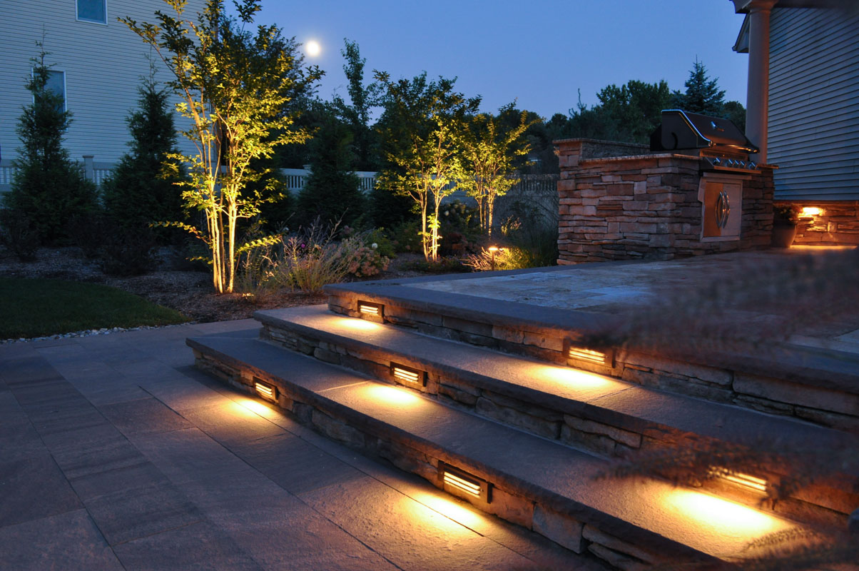 slab stone steps at night with built in step lighting