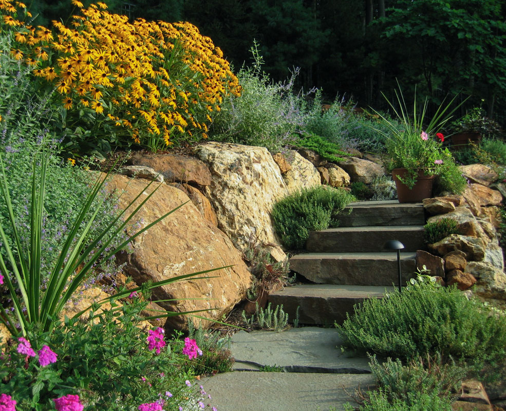 natural stone steps with boulder wall