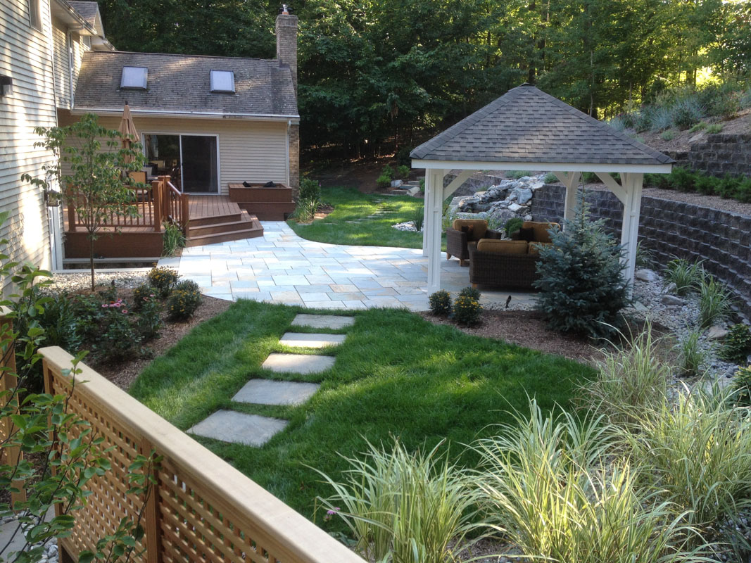 Stepping Stones Lead to Bluestone Patio with Pavilion