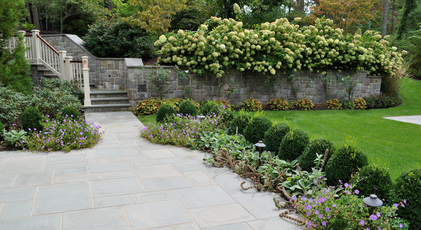 retaining wall with granite veneer, formal nj landscape design
