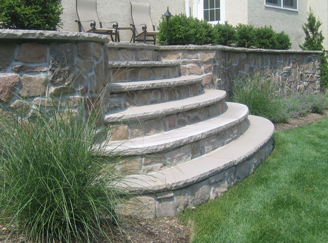 retaining wall and slab steps with veneer stone