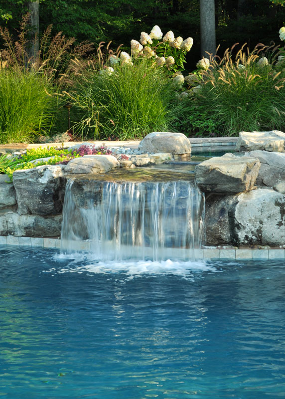 pool waterfall coming from upper level spa