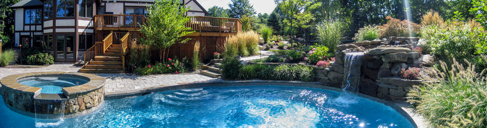 swimming pool with bluestone coping, spa, pool waterfall