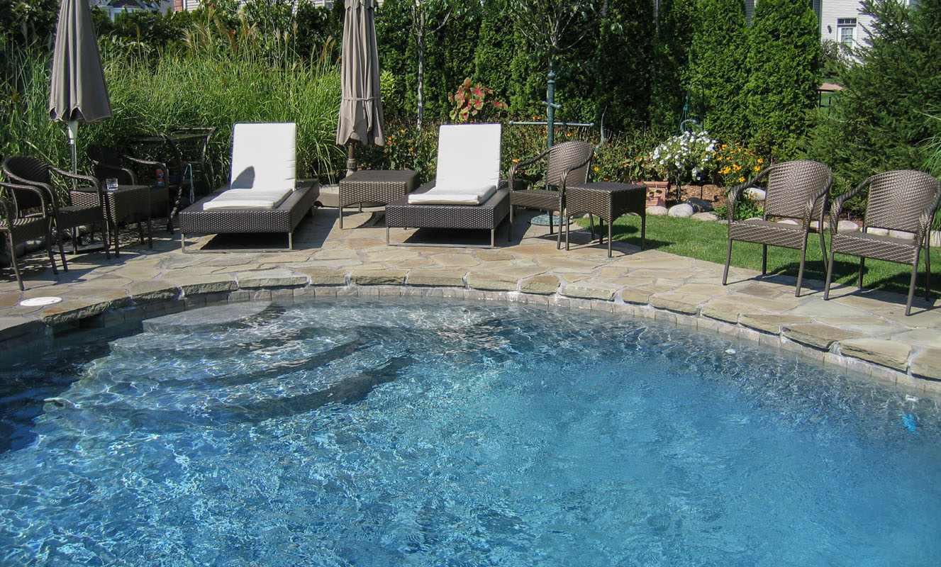 swimming pool steps, patio, and pool landscaping