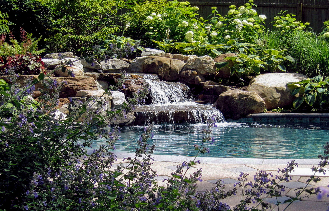 kid and pet safe natural stone pool waterfall 