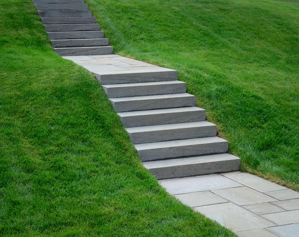 slab ston steps and bluestone front walkway