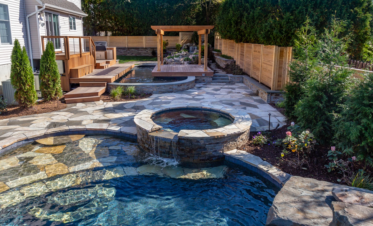 backyard landscape design with pergola, spa, gunite pool, ipe deck, waterfall, koi pond