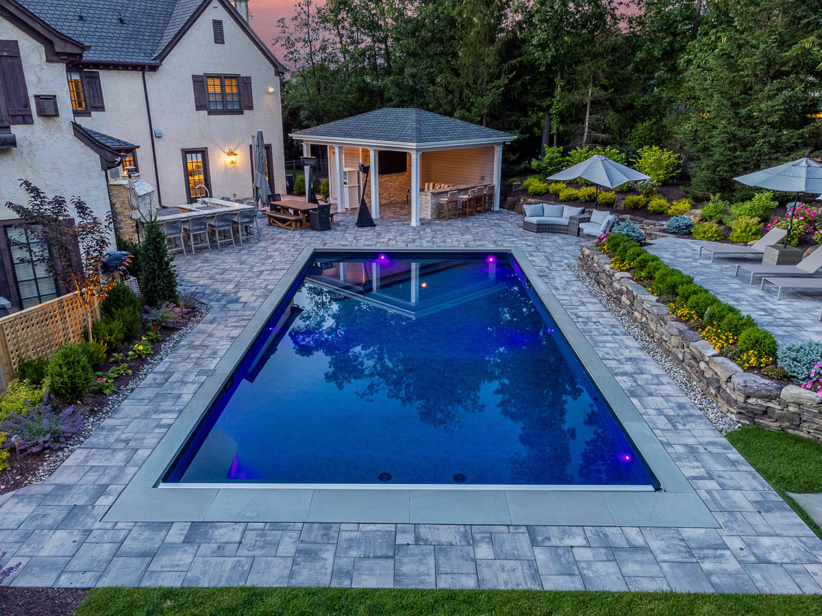 nj landscape design featuring rectangular vinyl swimming pool