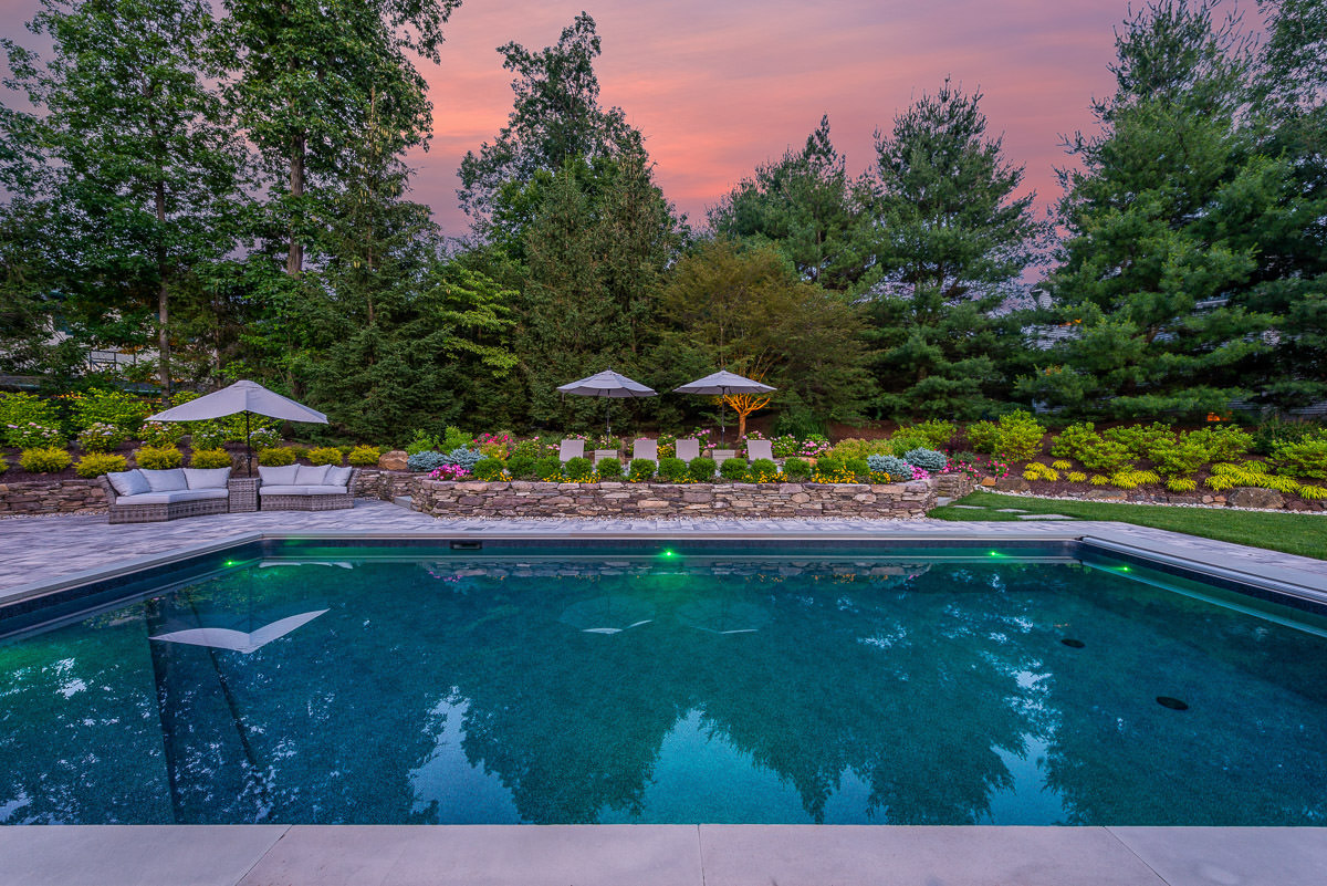 new jersey pool landscape with raised patio