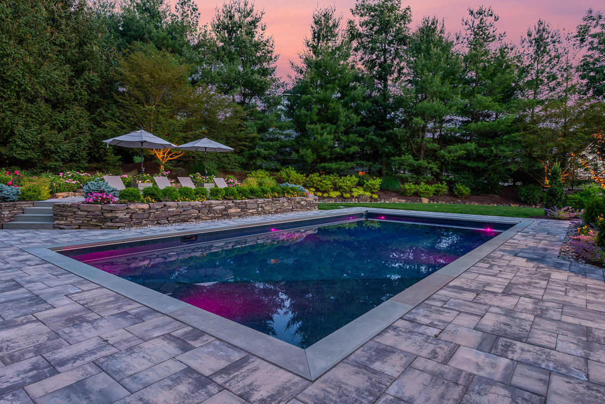 rectangular pool, landscaping, paver patio
