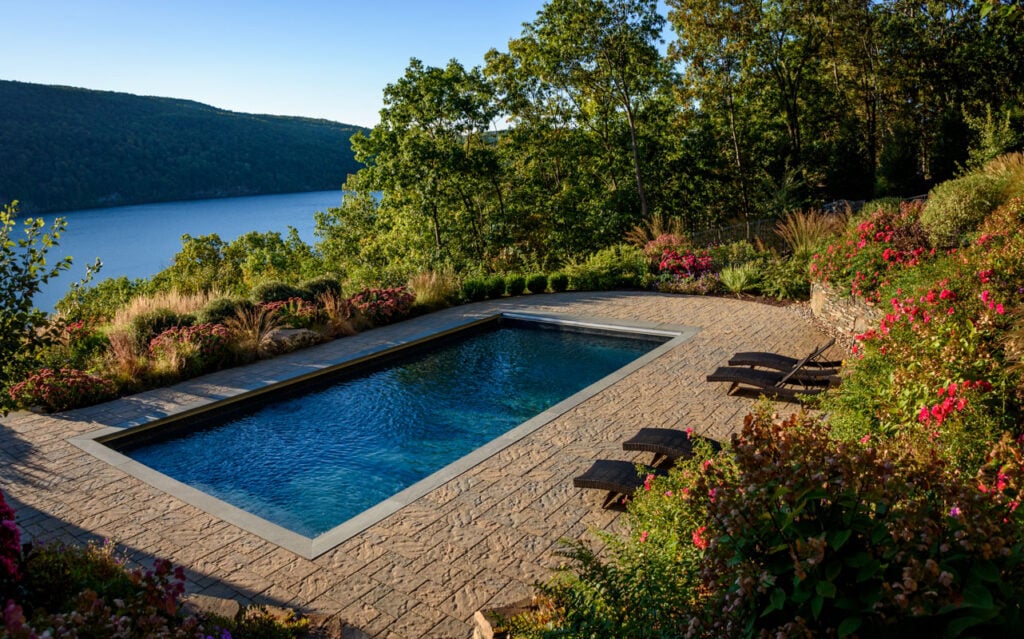 Greenwood Lake New York mountainside pool with surrounding landscape by CLC