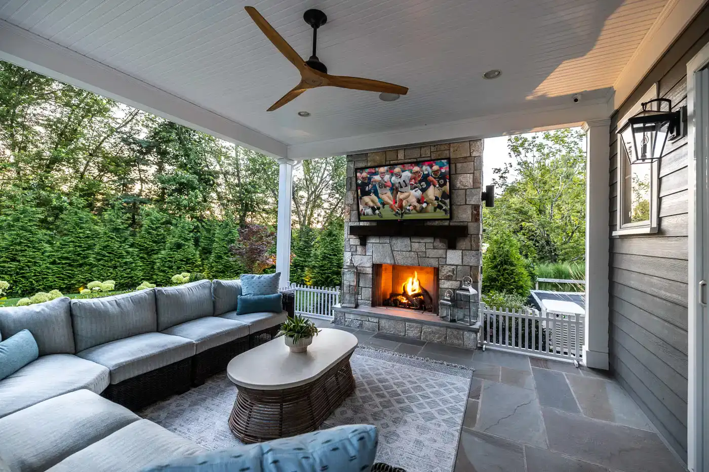 Patio fireplace and lounge area NJ by CLC Landscape Design.
