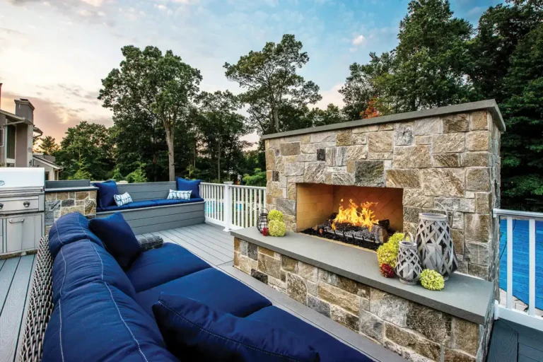 Double-sided backyard outdoor fireplace NJ patio by CLC Landscape Design.