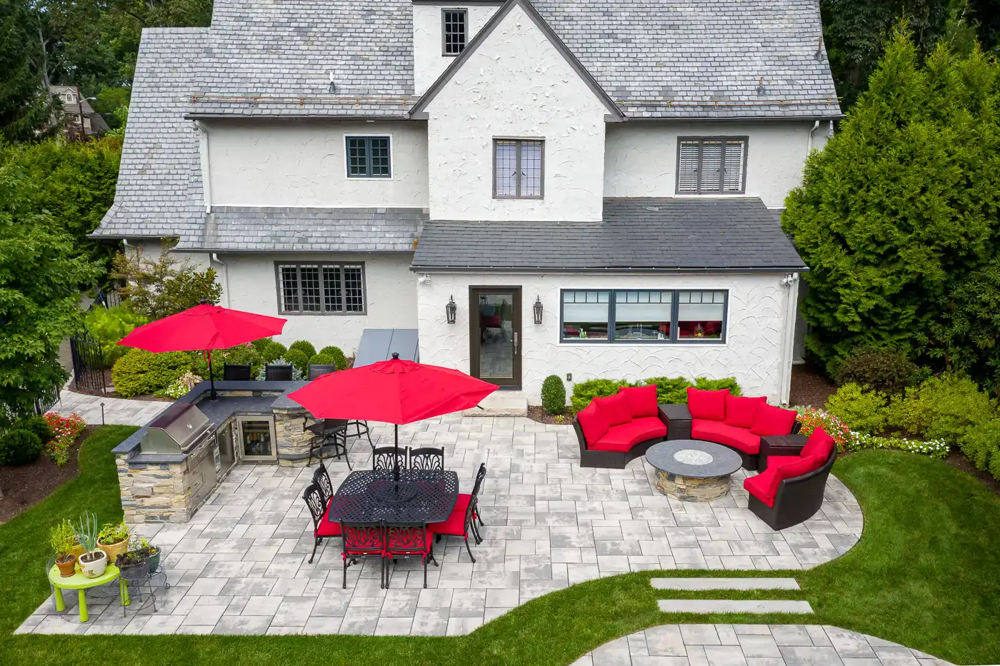 Outdoor kitchen fully integrated with patio and seating area in NJ.