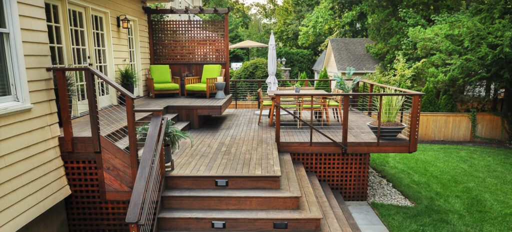 Sleek composite deck and entertaining area created by CLC Landscape Design in Ringwood NJ.