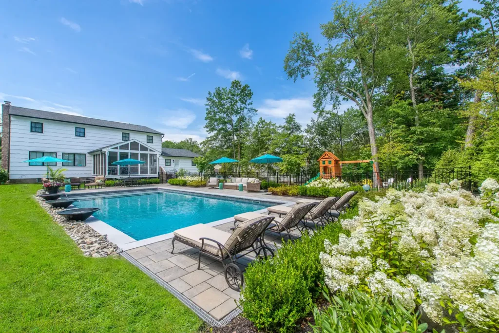 Hydrangea garden in Pine Brook, New Jersey by CLC Landscape Design featuring lush blooming hydrangeas, layered plantings, and a beautifully maintained landscape